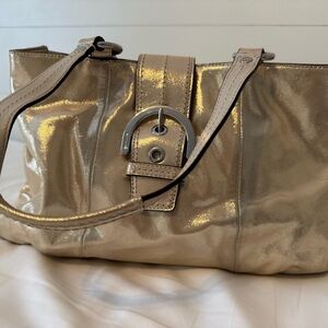 Coach Metallic Gold Shoulder Bag with Slouchy Shape and Silver Hardware